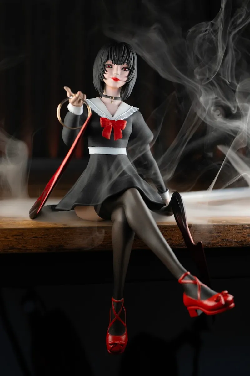 Custom figure of a girl in a school uniform with a red sword, photo by the customer