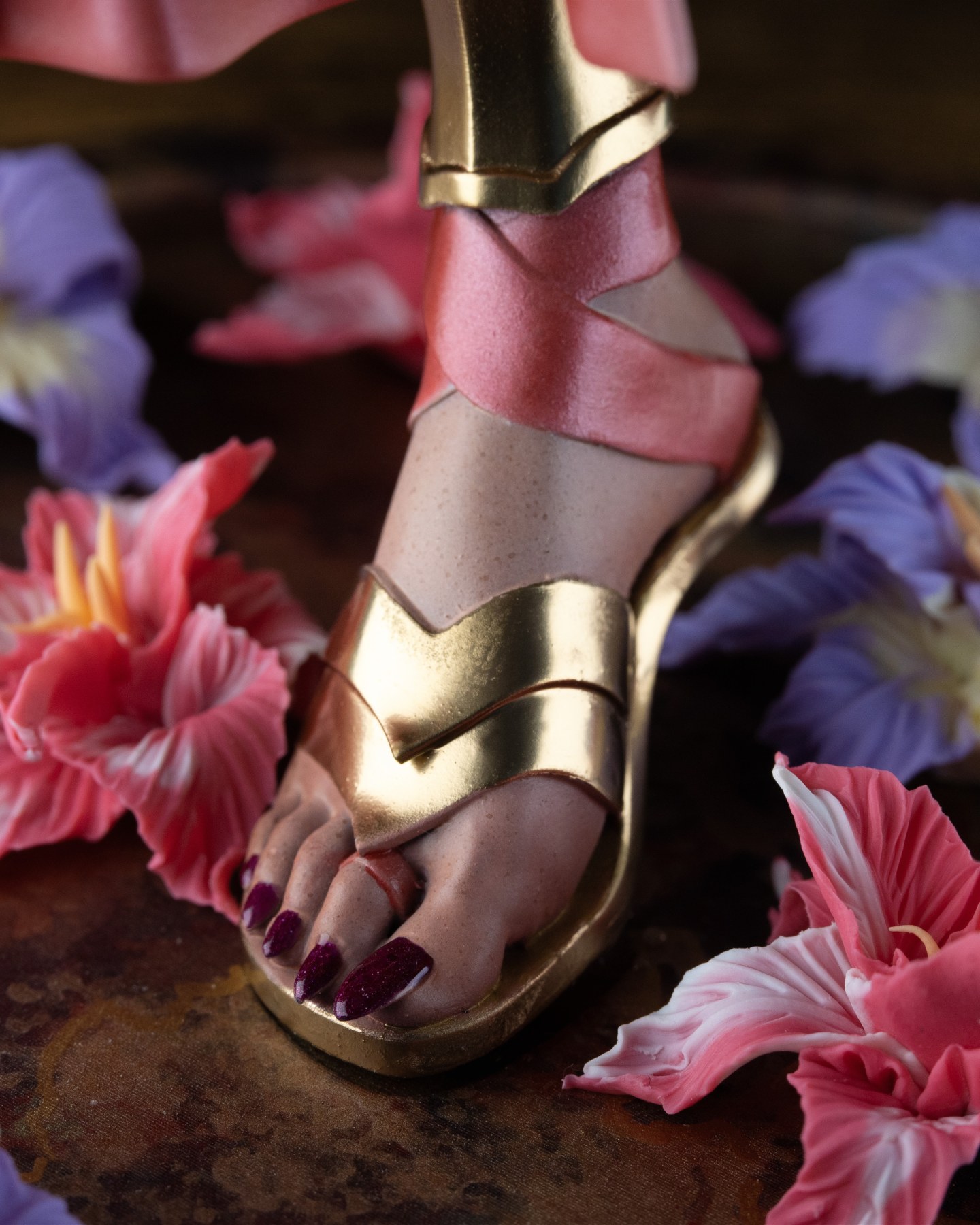 Nyxara, hand-painted sandal and sculpted flowers, close-up